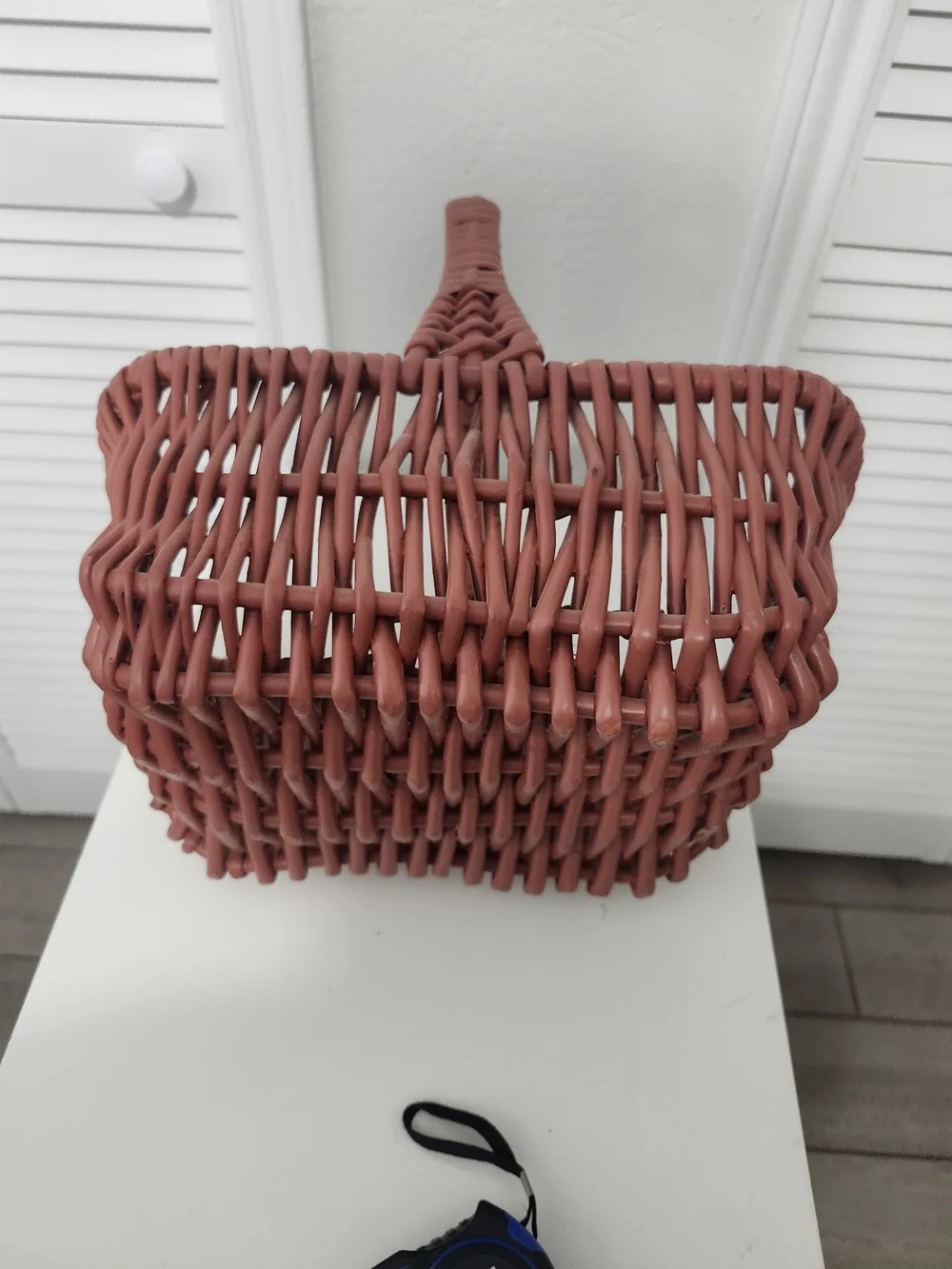 Handwoven Rust-Colored Decorative Storage Basket with Handle